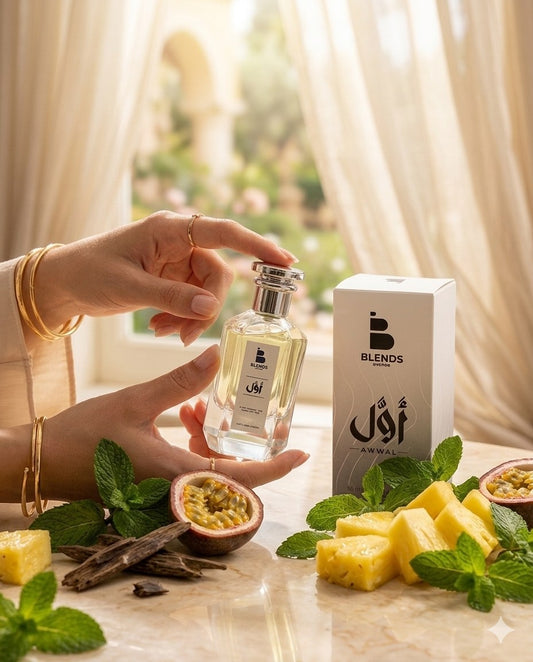 Awwal bottle held beside its signature box